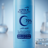 Close-up of ActiveX 70% Isopropyl Alcohol trigger spray bottle for salon hygiene