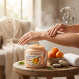 Woman using ActiveX Apricot Face and Body Scrub as part of her skincare routine