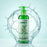 Green shampoo bottle labeled 'active X Aloe Vera Shampoo' surrounded by water splashes on a light blue background.