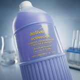 Close up of ActiveX Activecide disinfectant label showing isopropyl alcohol formula for salon tools