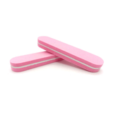 Close-up of pink oblong nail buffer designed for nail polishing and smoothing