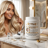 Professional hairstylist applying ActiveX white bleaching powder for full hair bleaching service