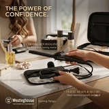Woman styling smooth curls using Westinghouse WHCT400 hair curling tong